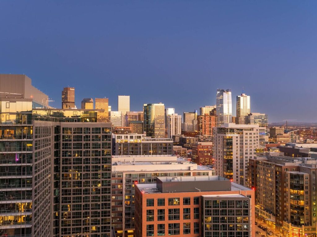 view of downtown denver from balcony of luxury condo